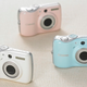 Illustration for article titled Canons E1 Digital Camera is Shiny, Curvy, in Baby Pink and Blue